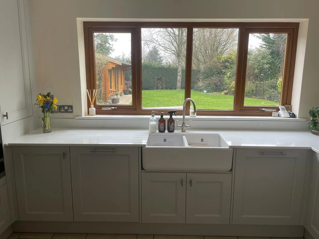 Bespoke sink run and worktop with garden view
